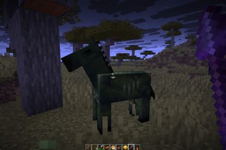 Minecraft how to tame a zombie horse